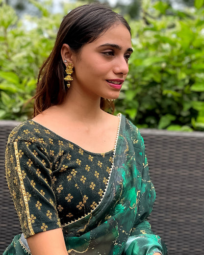 Model pairing the blouse with a saree for a traditional look.