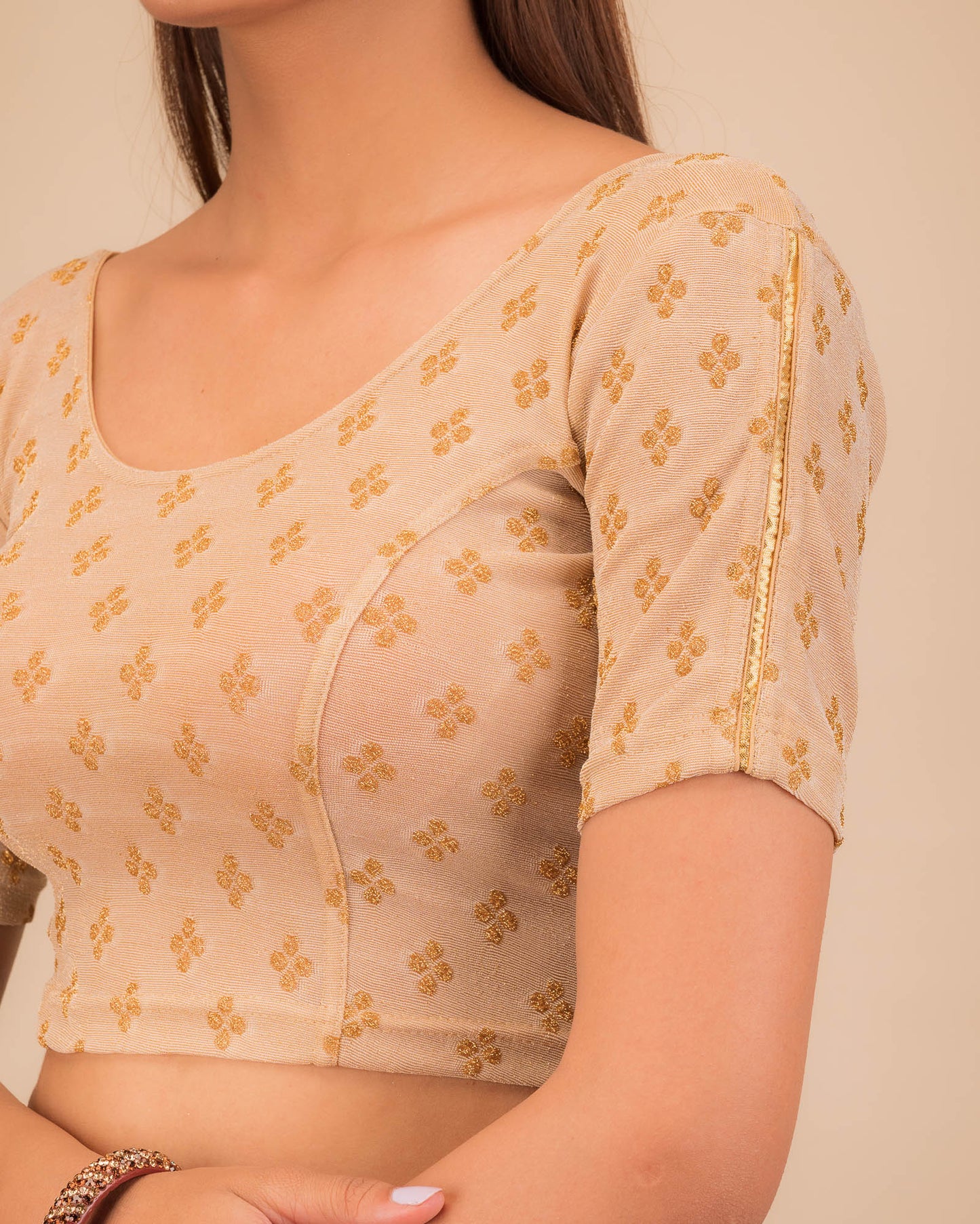 Close-up of jacquard fabric and motif detailing.