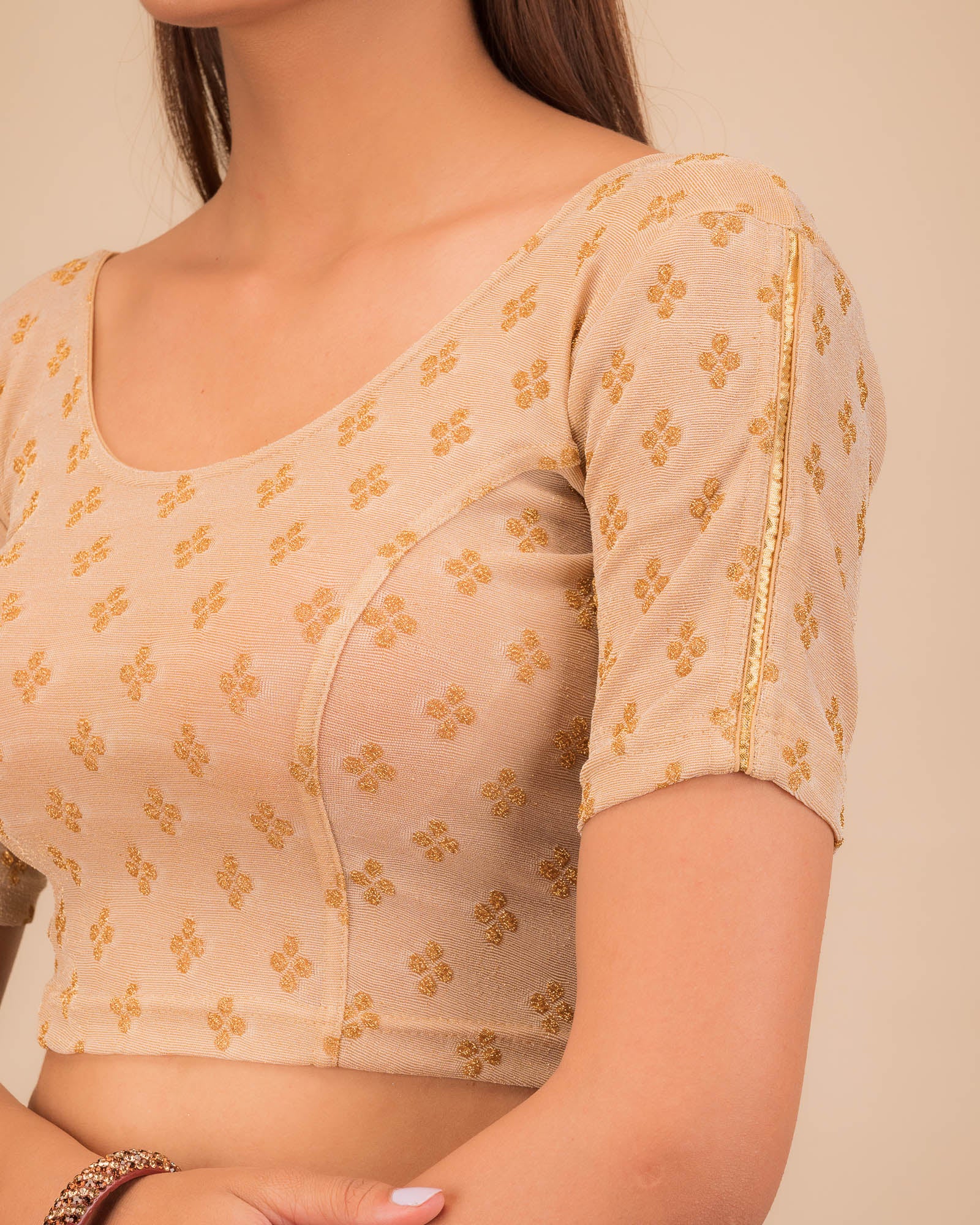 Close-up of jacquard fabric and motif detailing.