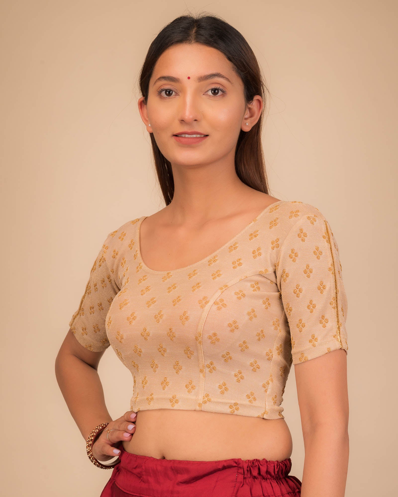 Side profile emphasizing the blouse’s fit and sleeve structure.