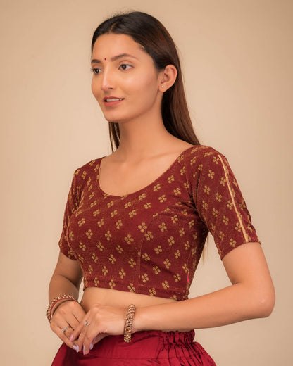 Side profile emphasizing the blouse’s fit and sleeve structure.