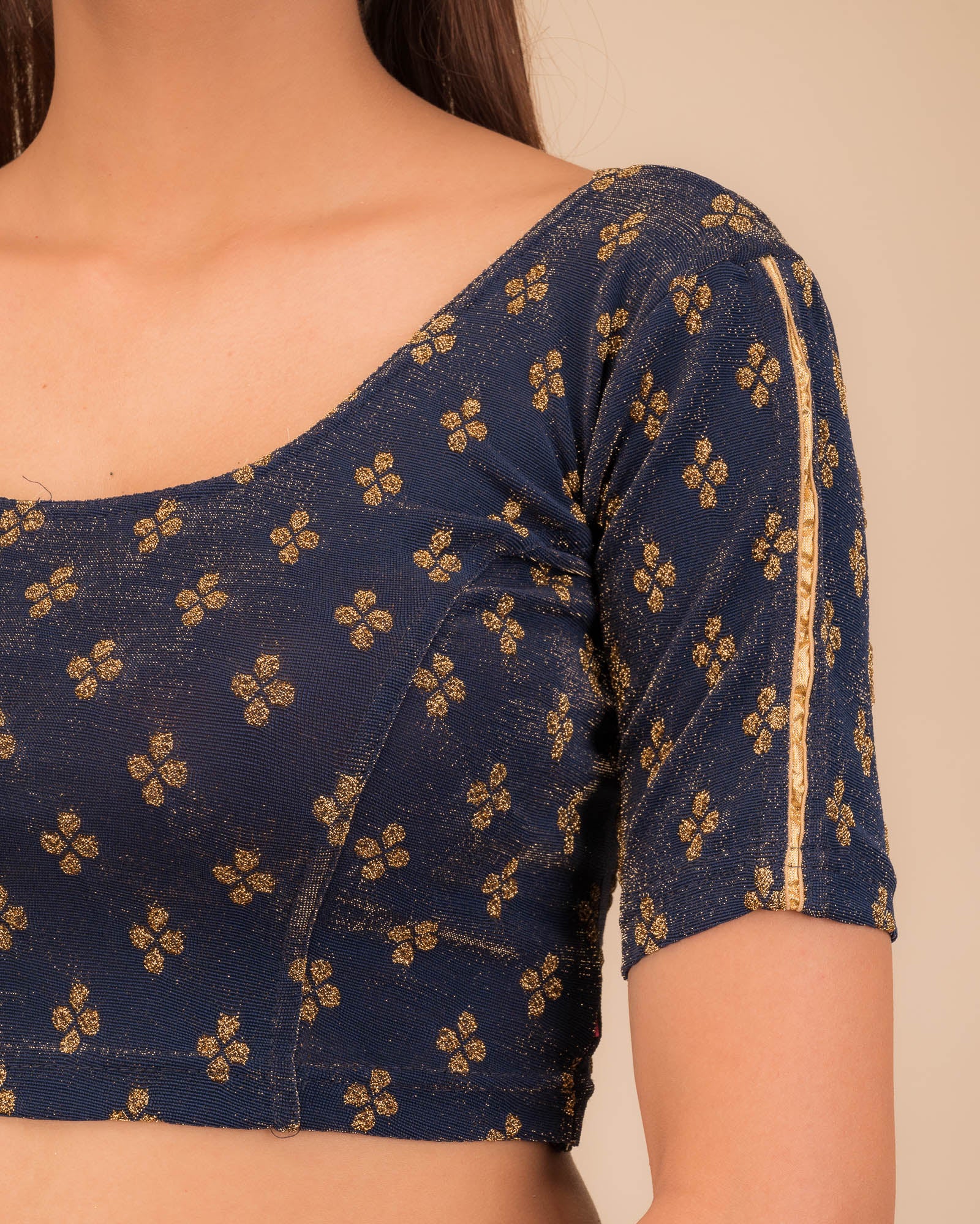 Close-up of jacquard fabric and motif detailing.
