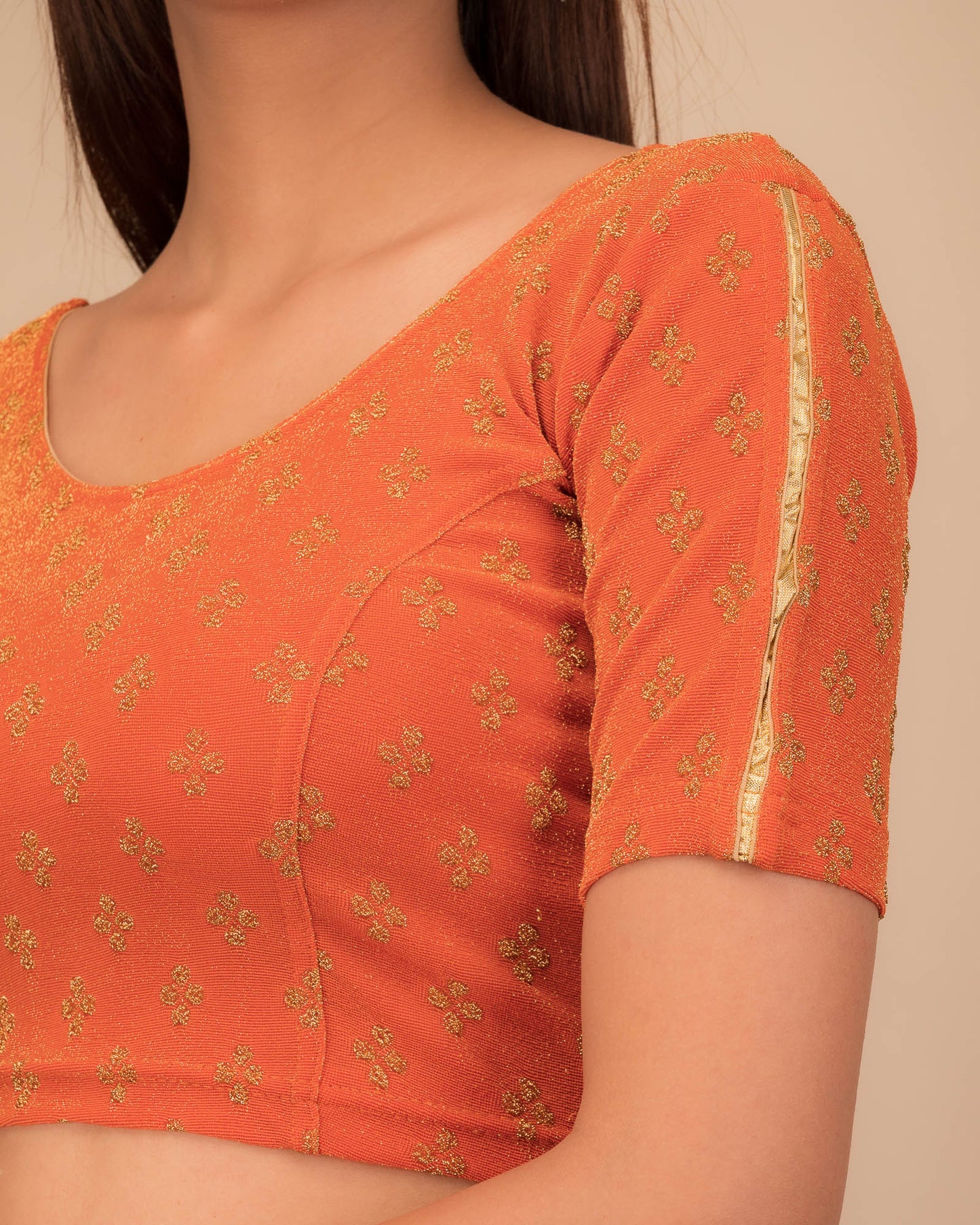 Close-up of jacquard fabric and motif detailing.