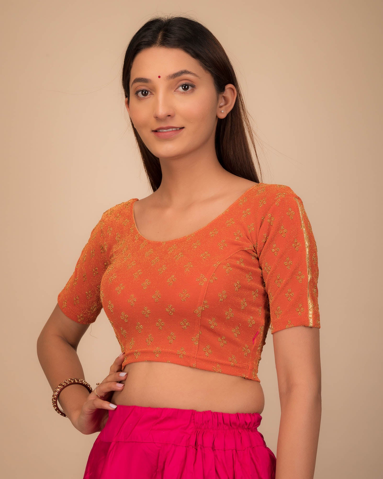 Side profile emphasizing the blouse’s fit and sleeve structure.