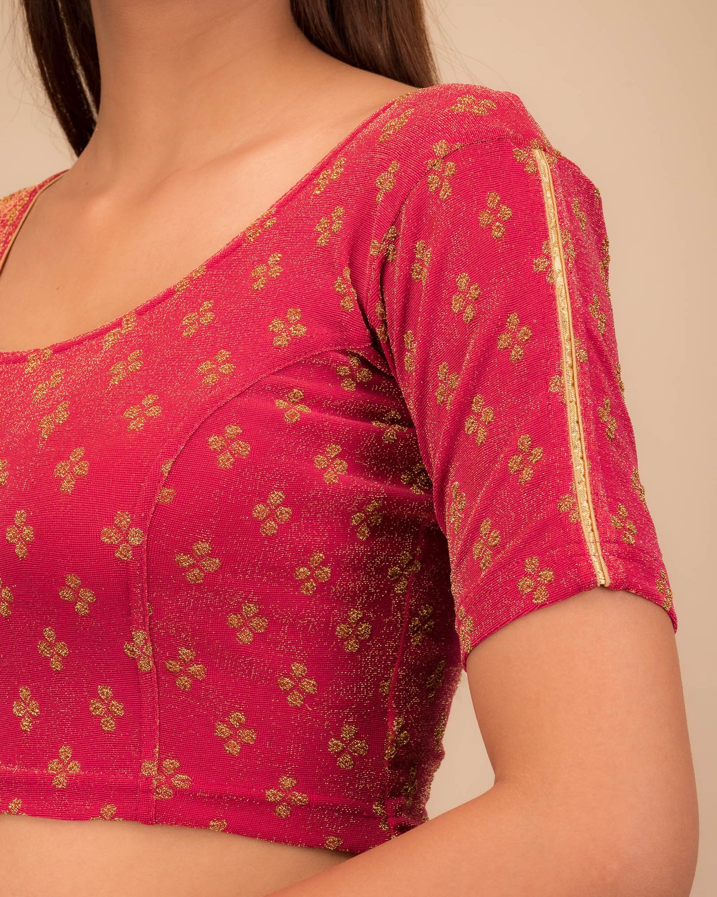 Close-up of jacquard fabric and motif detailing.