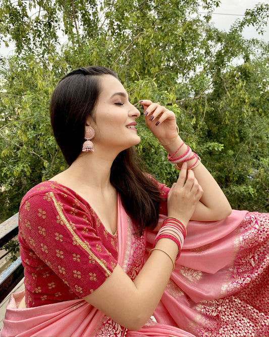 Model pairing the blouse with a saree for a traditional look.