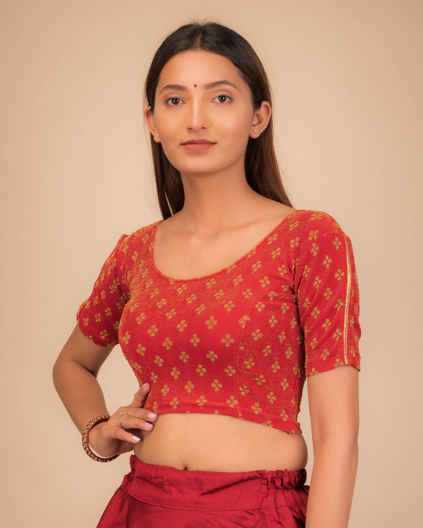 Side profile emphasizing the blouse’s fit and sleeve structure.