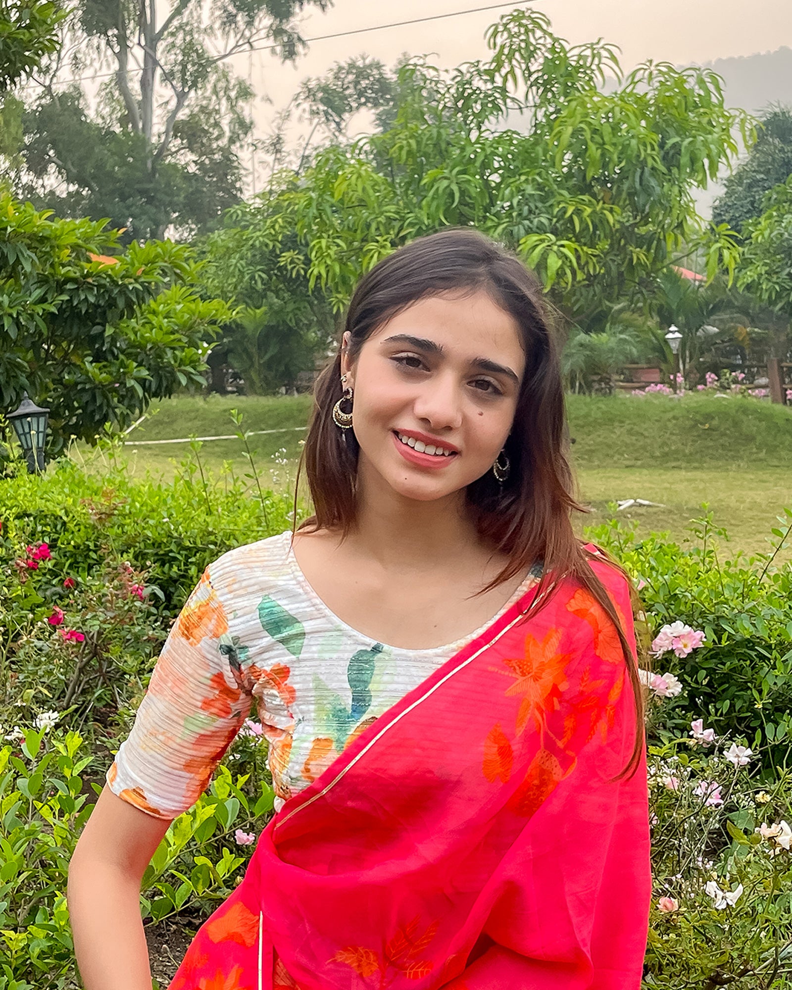 Model pairing the blouse with a saree for a festive-ready look.