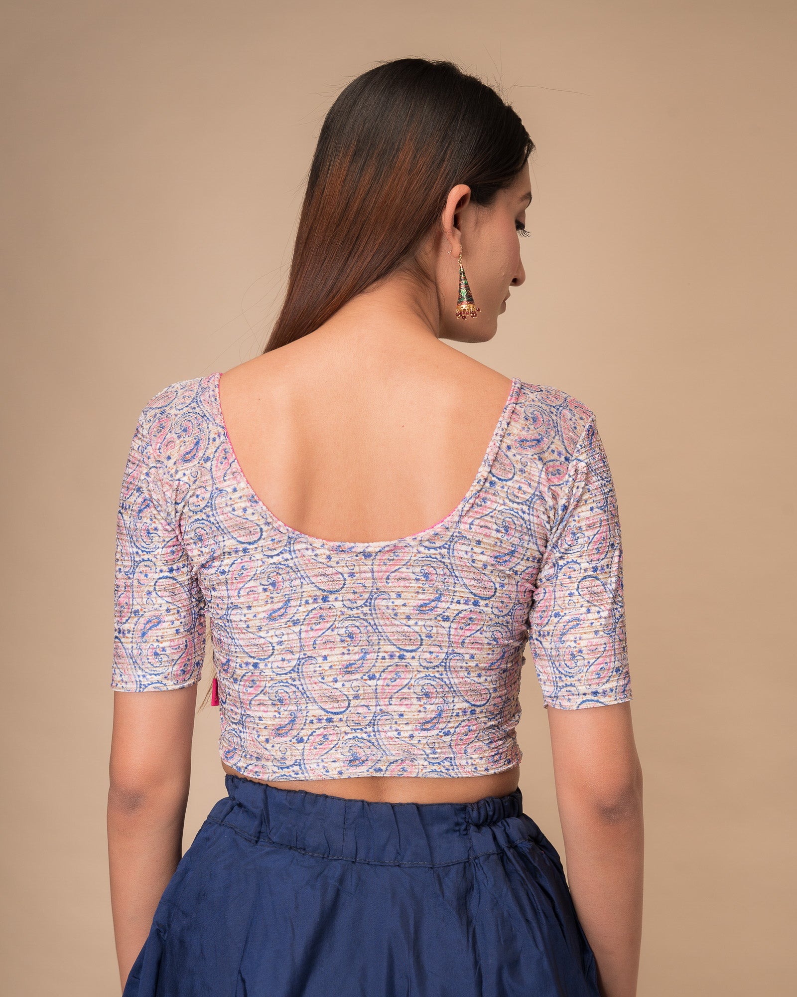 Rear view of the stretchable blouse showcasing the back design.