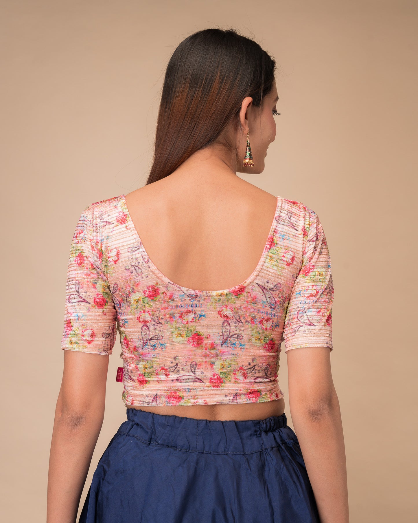 Rear view of the stretchable blouse showcasing the back design.
