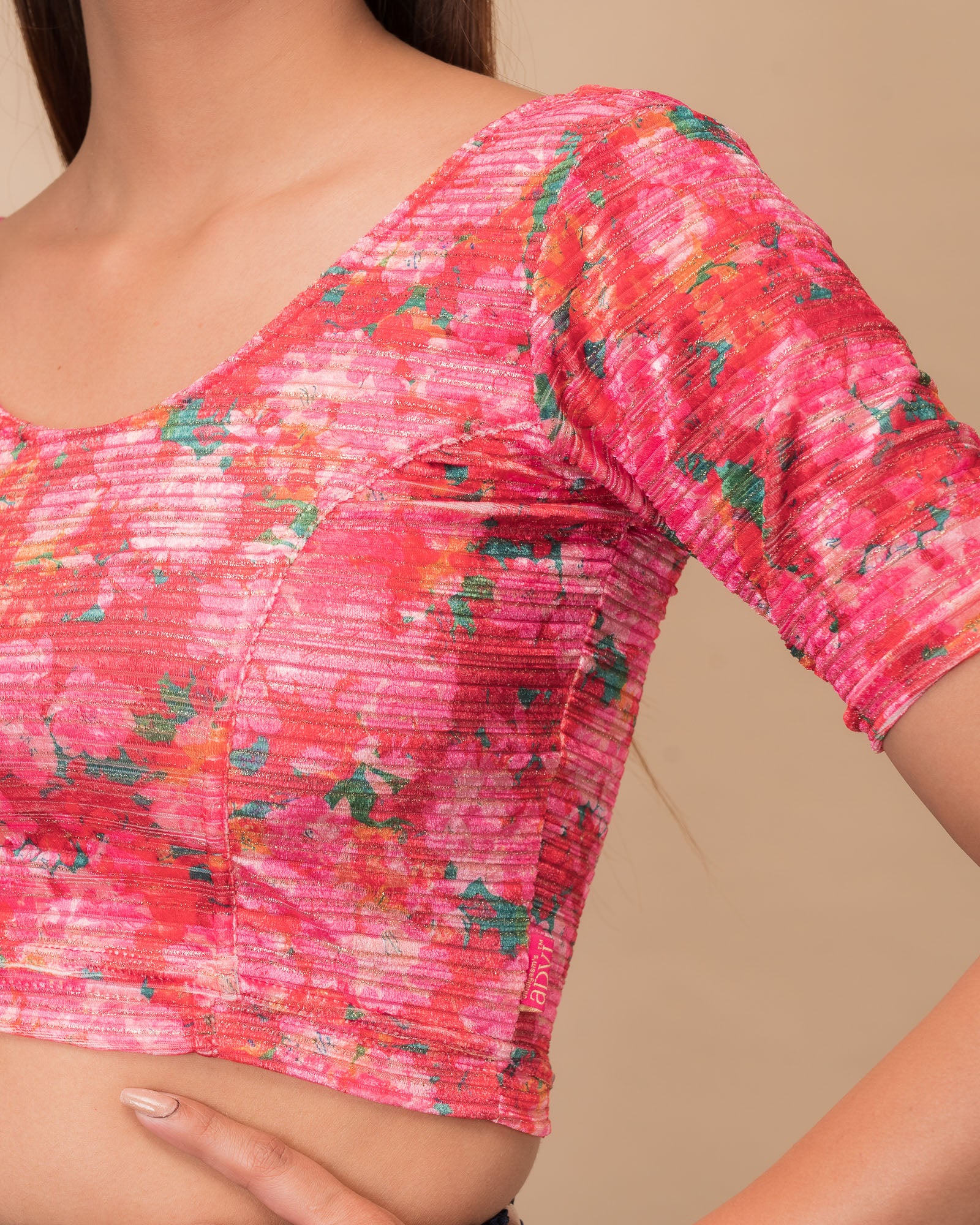 Close-up of the velvet fabric detailing the floral print texture.