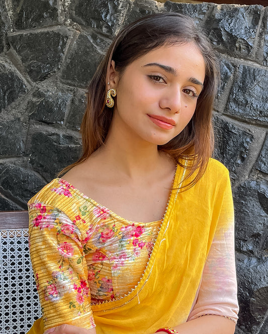 Model pairing the blouse with a saree for a festive-ready look.