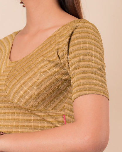 Close-up of the zari stripe fabric detailing the texture and stretchability of the readymade blouse