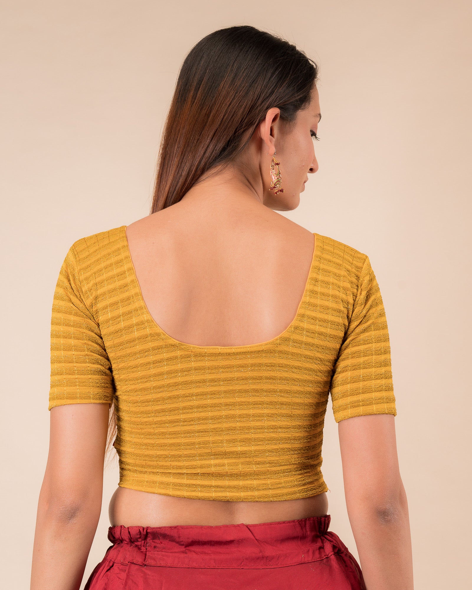 Rear view of the zari stripe stretchable blouse showcasing the back design