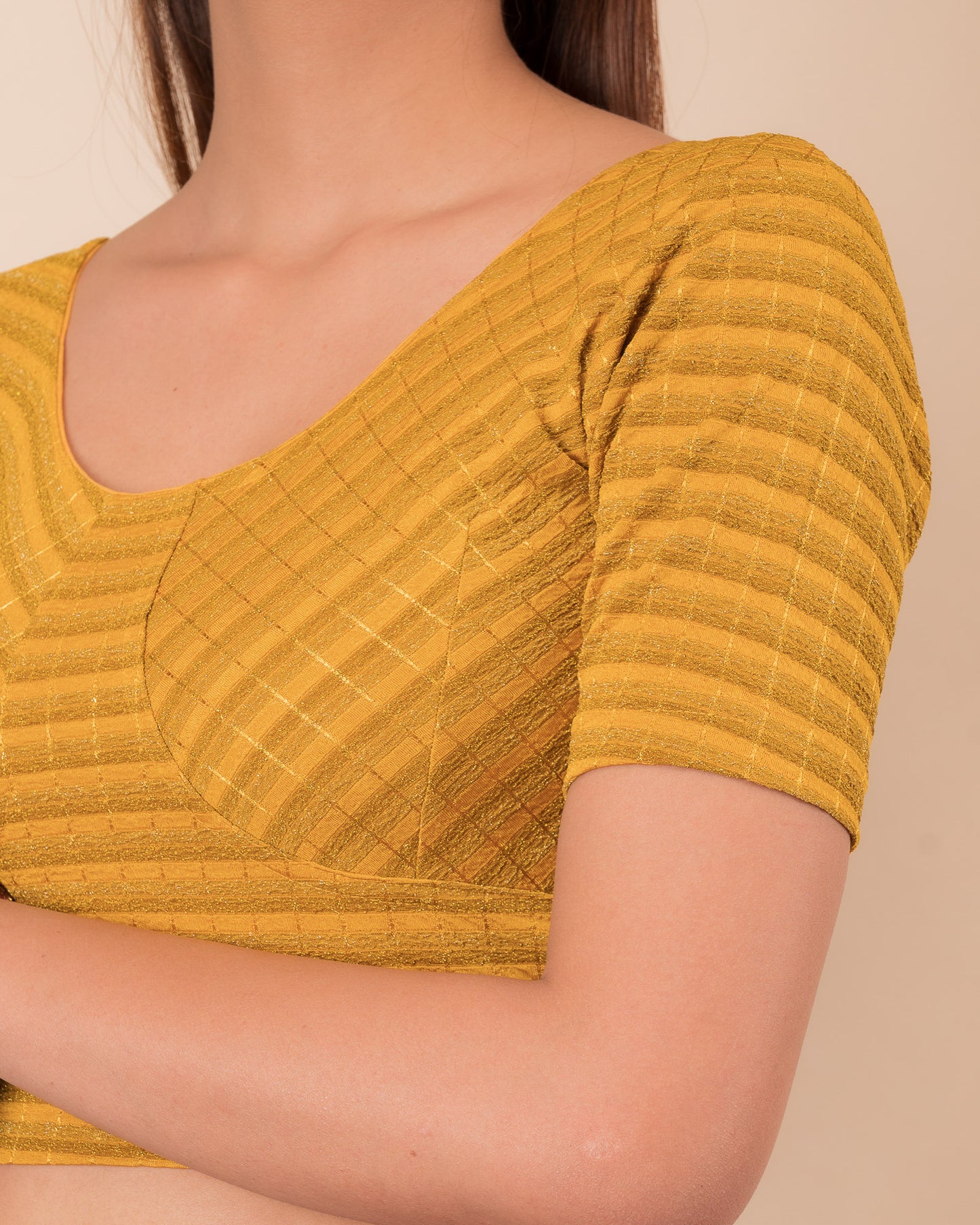 Close-up of the zari stripe fabric detailing the texture and stretchability of the readymade blouse