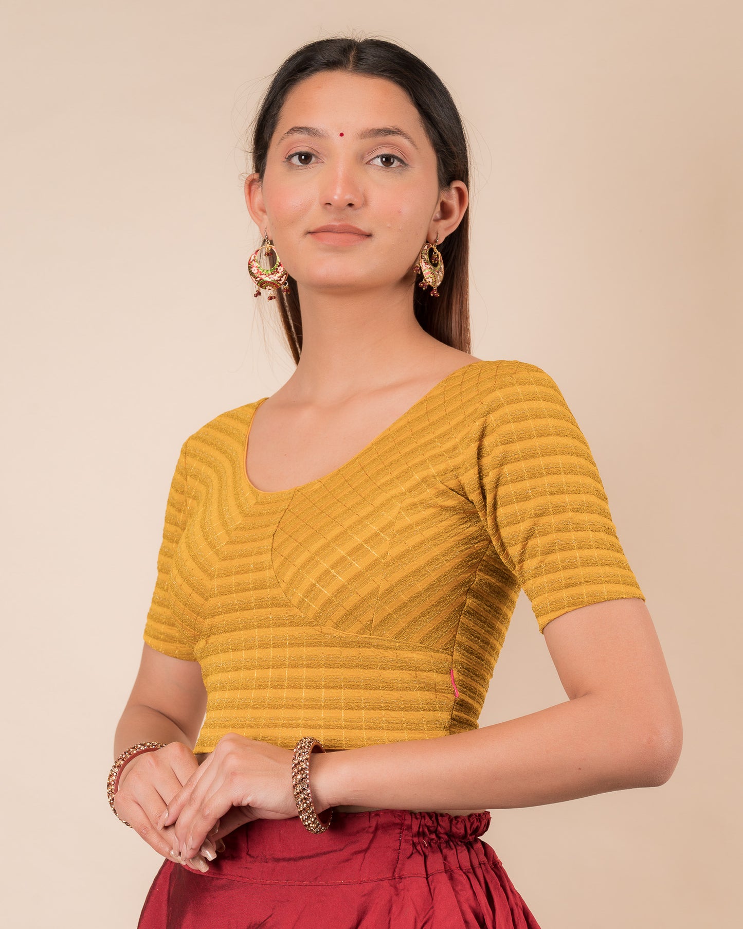 Side profile of the zari stripe stretchable blouse highlighting the fit and sleeve length