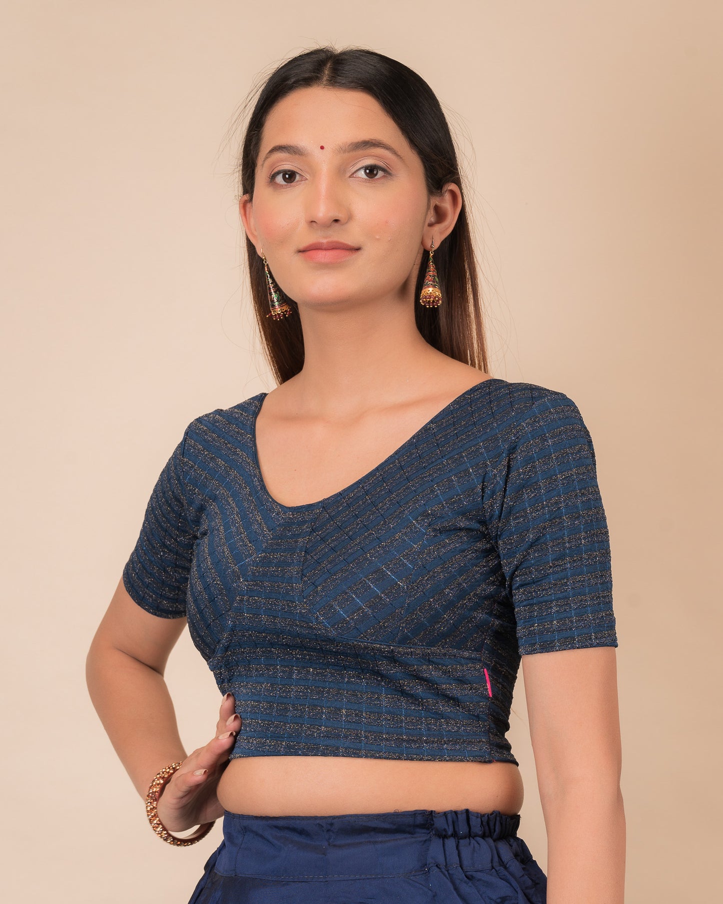 Side profile of the zari stripe stretchable blouse highlighting the fit and sleeve length