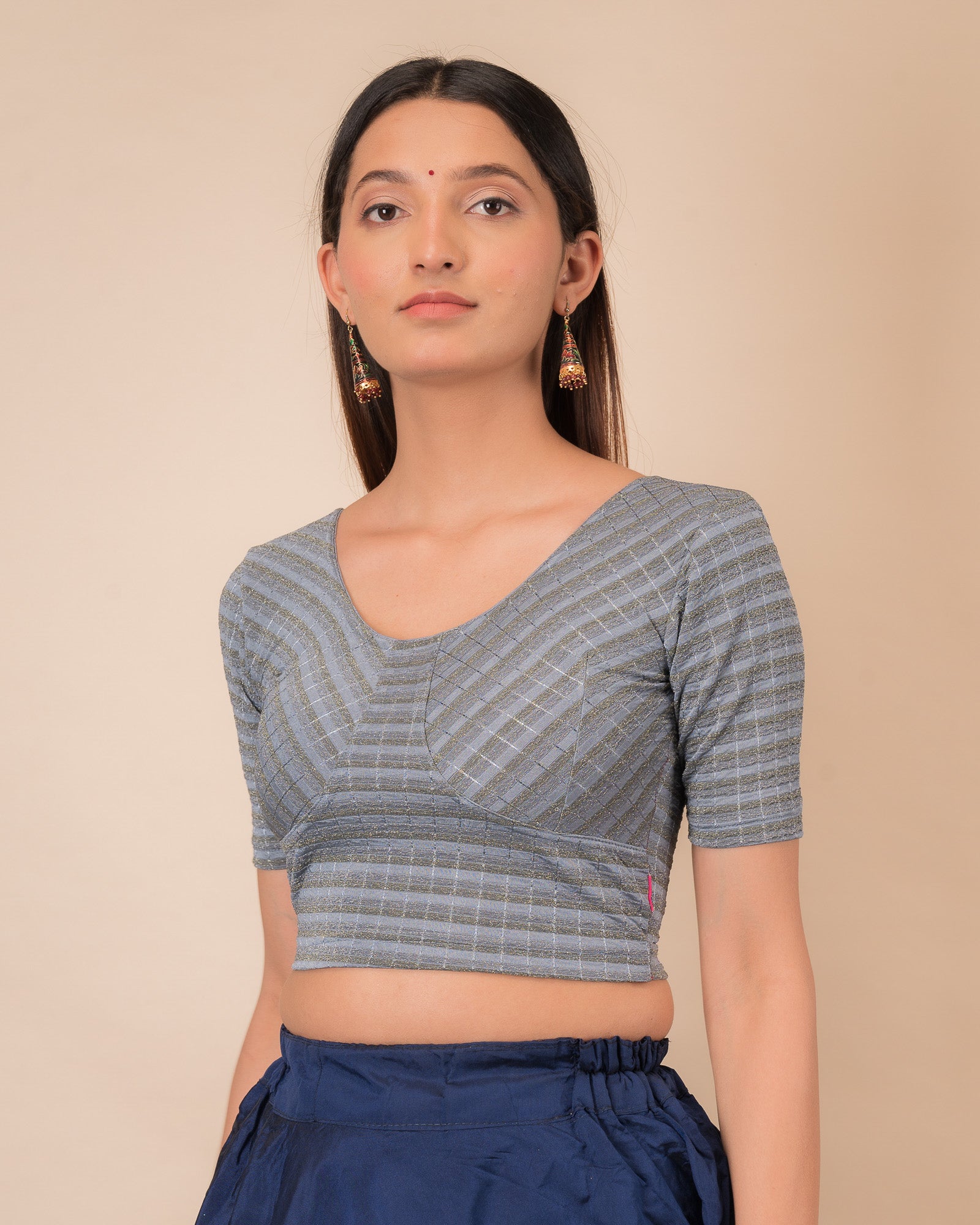 Side profile of the zari stripe stretchable blouse highlighting the fit and sleeve length