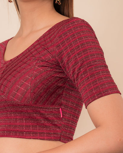 Close-up of the zari stripe fabric detailing the texture and stretchability of the readymade blouse
