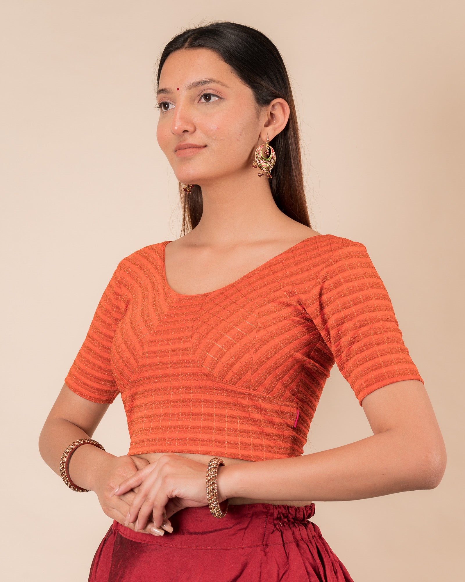 Side profile of the zari stripe stretchable blouse highlighting the fit and sleeve length