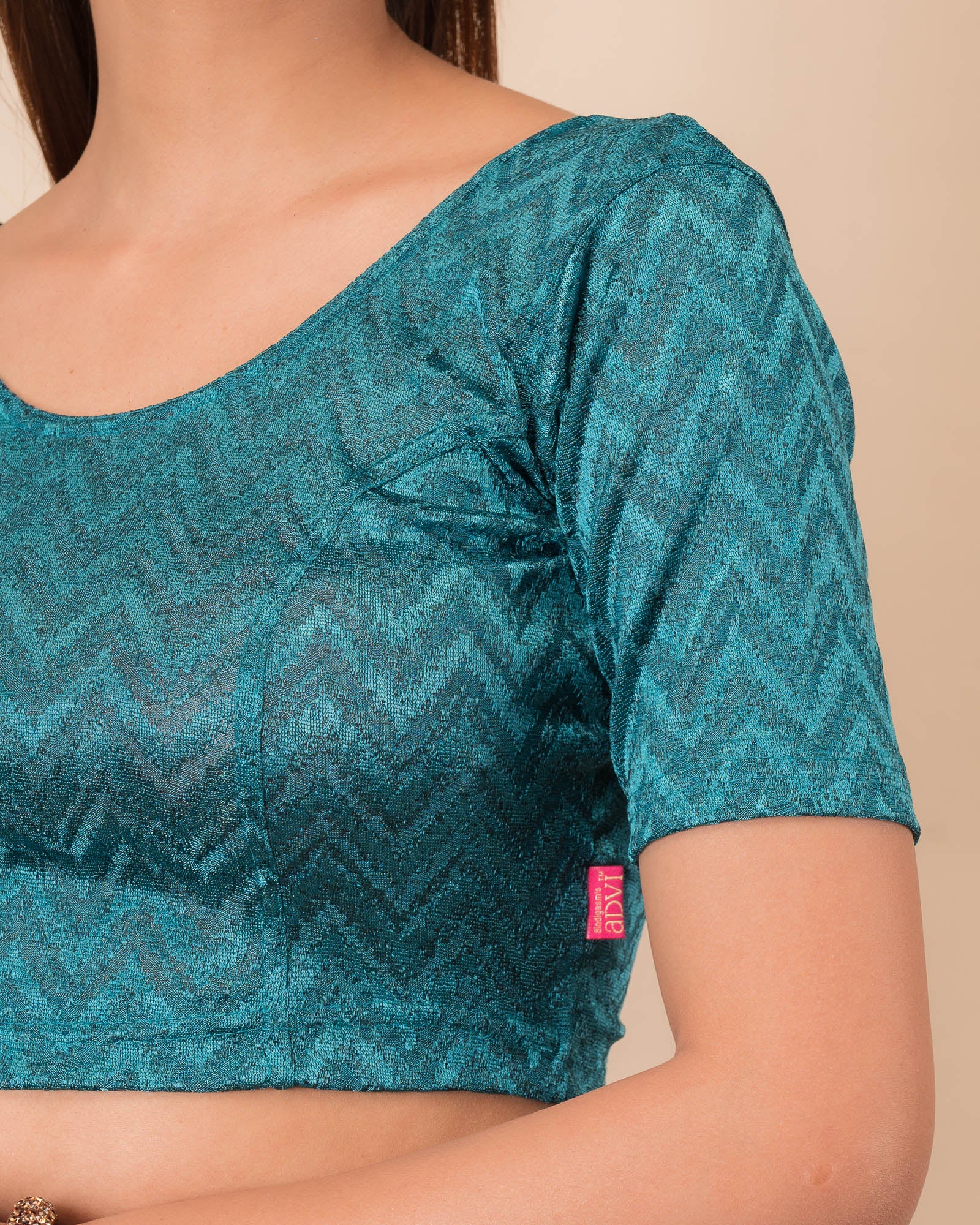 Close-up of the melange jacquard fabric detailing the zig-zag pattern and texture
