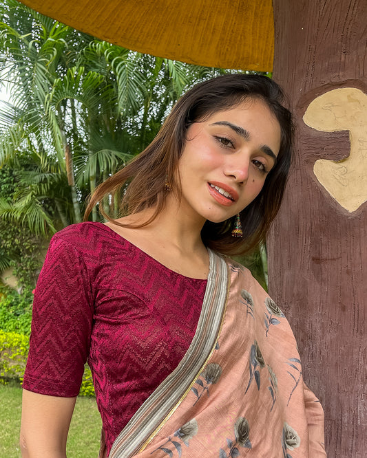 Model pairing the maroon melange zig-zag blouse with a traditional saree, demonstrating a complete ethnic look