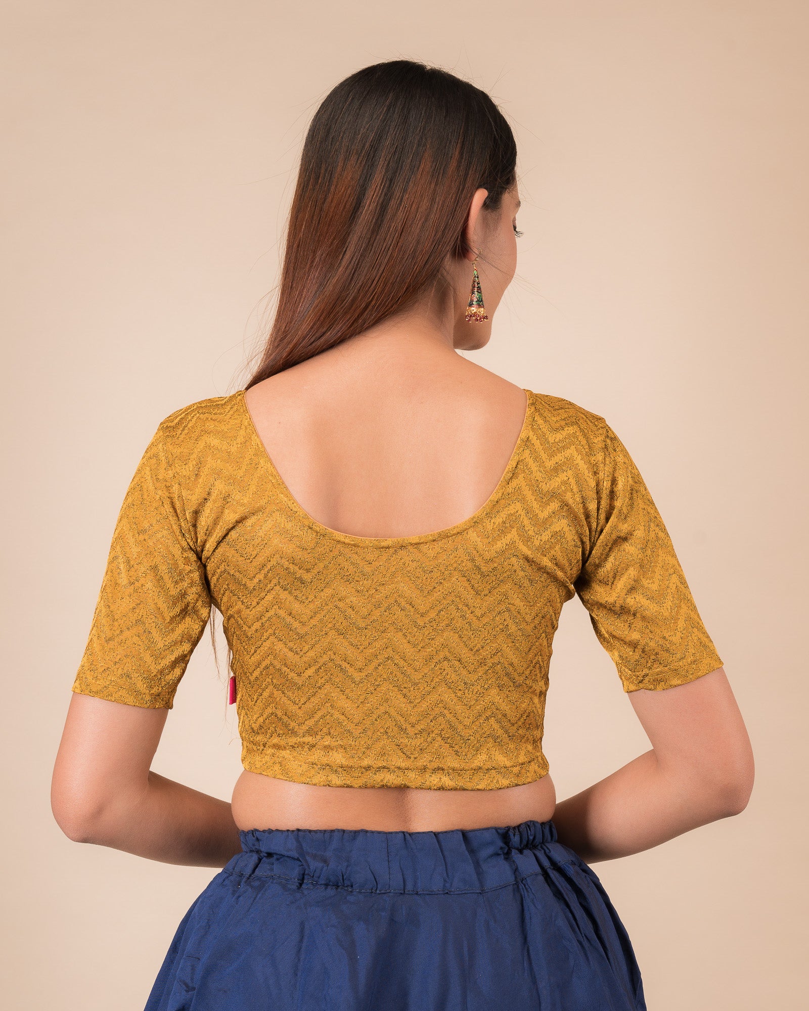 Rear view of the maroon melange zig-zag blouse showcasing the back design