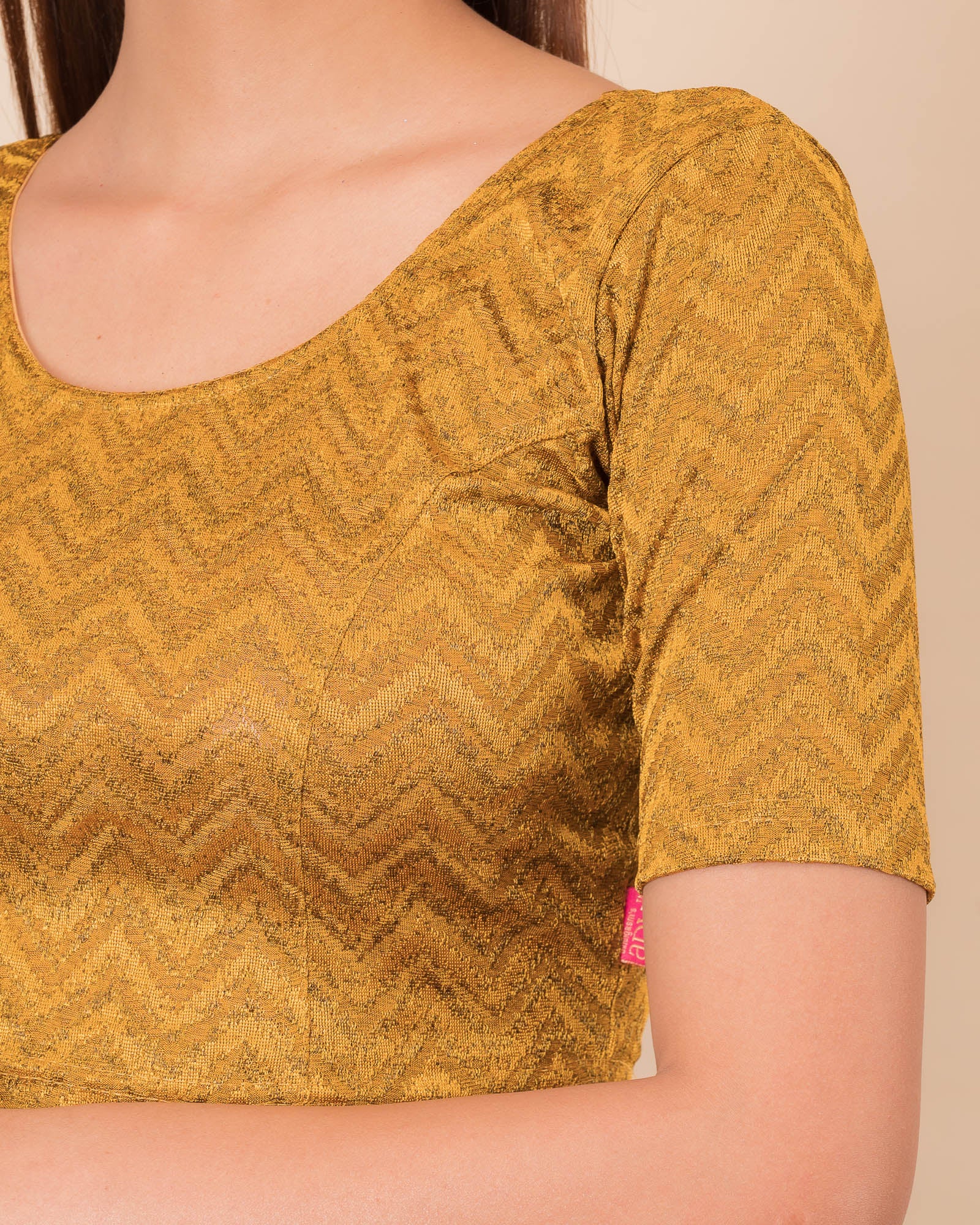 Close-up of the melange jacquard fabric detailing the zig-zag pattern and texture