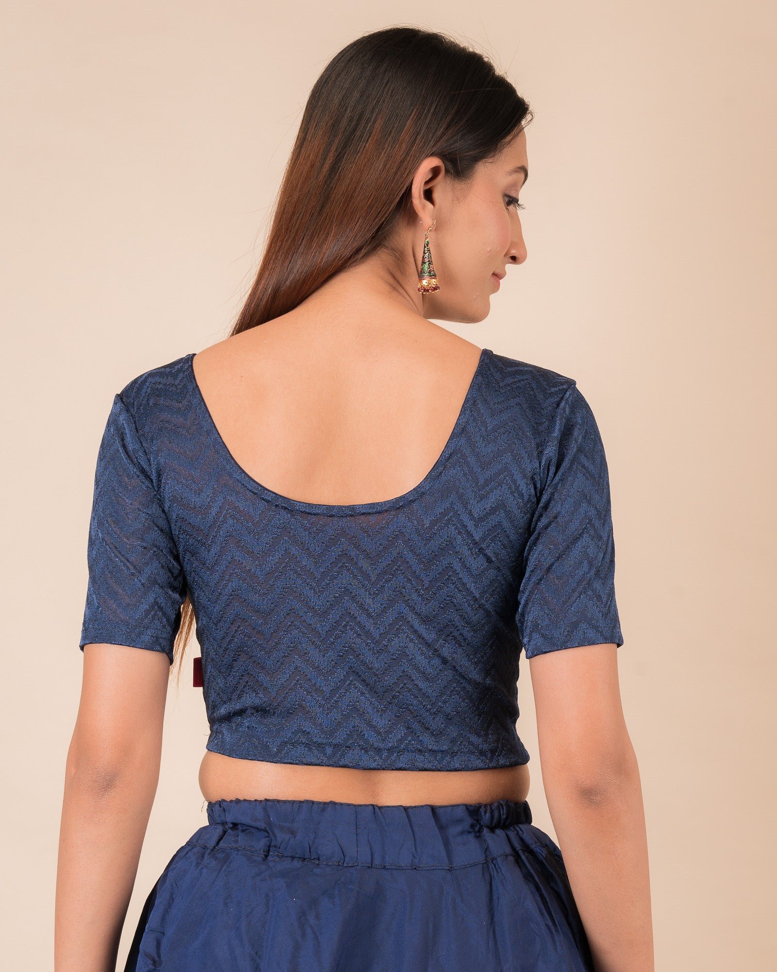 Rear view of the maroon melange zig-zag blouse showcasing the back design