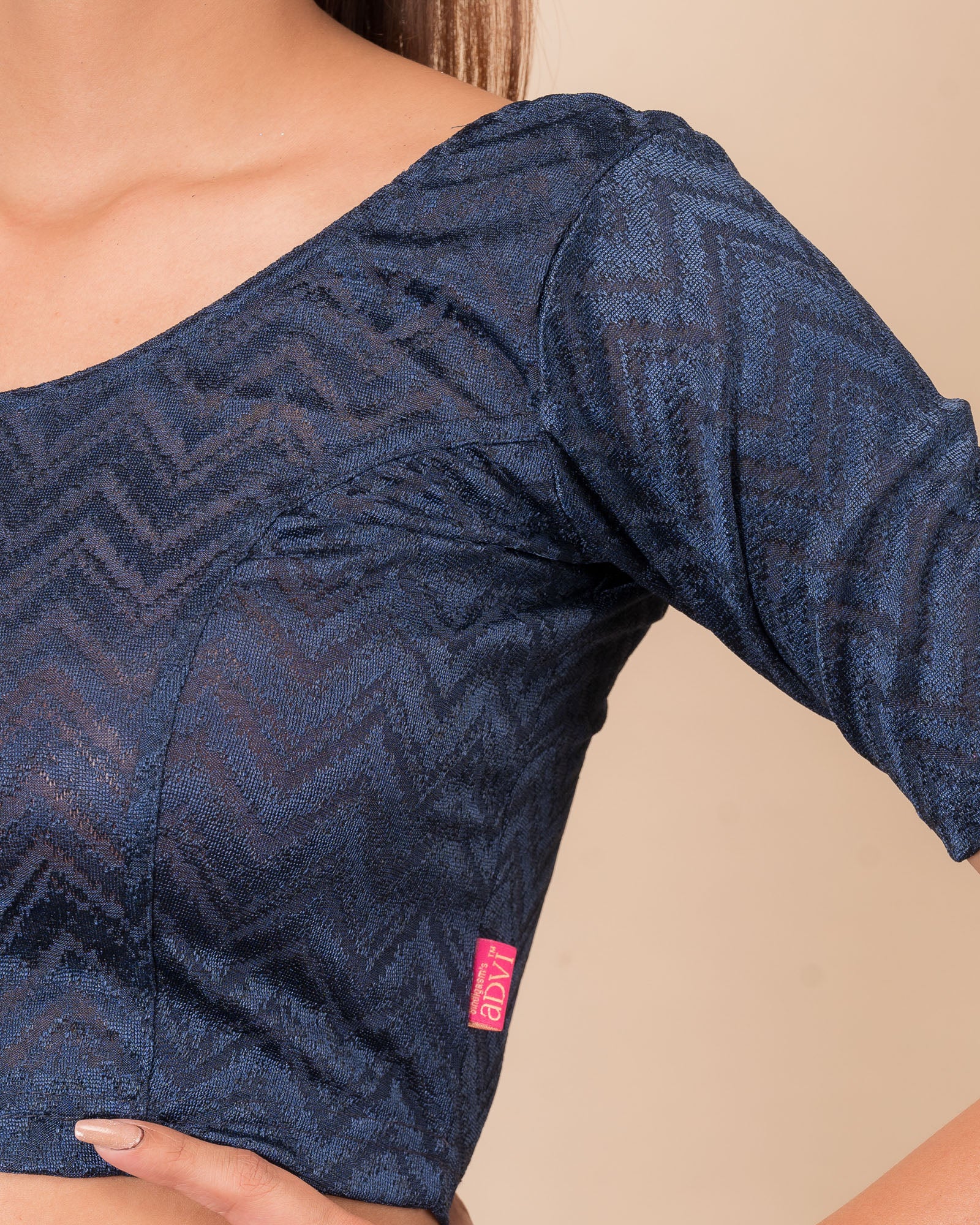 Close-up of the melange jacquard fabric detailing the zig-zag pattern and texture