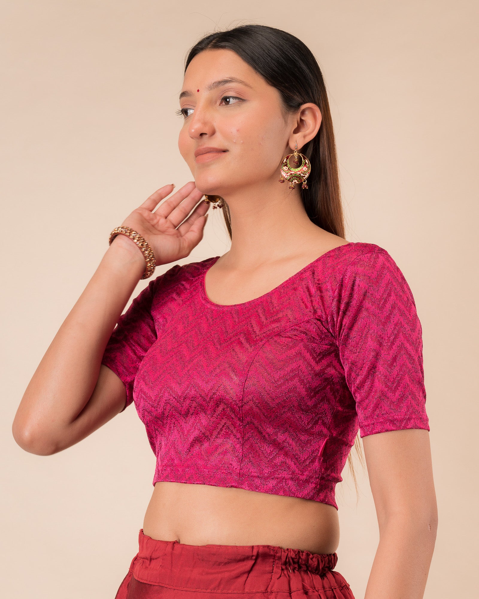 Side profile of the maroon melange zig-zag blouse highlighting the fit and sleeve length