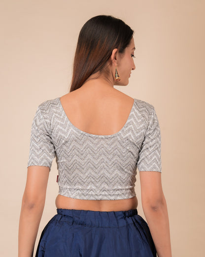 Rear view of the maroon melange zig-zag blouse showcasing the back design