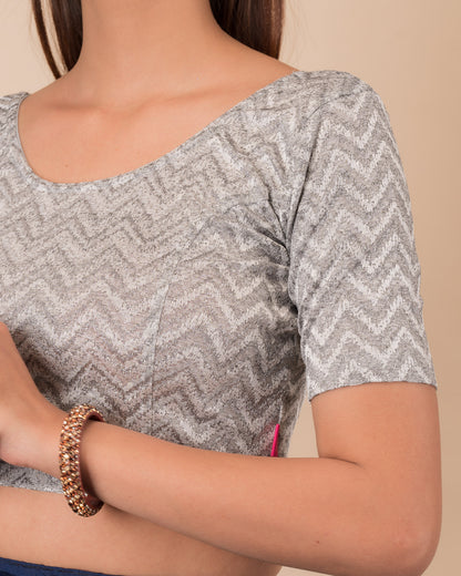 Close-up of the melange jacquard fabric detailing the zig-zag pattern and texture