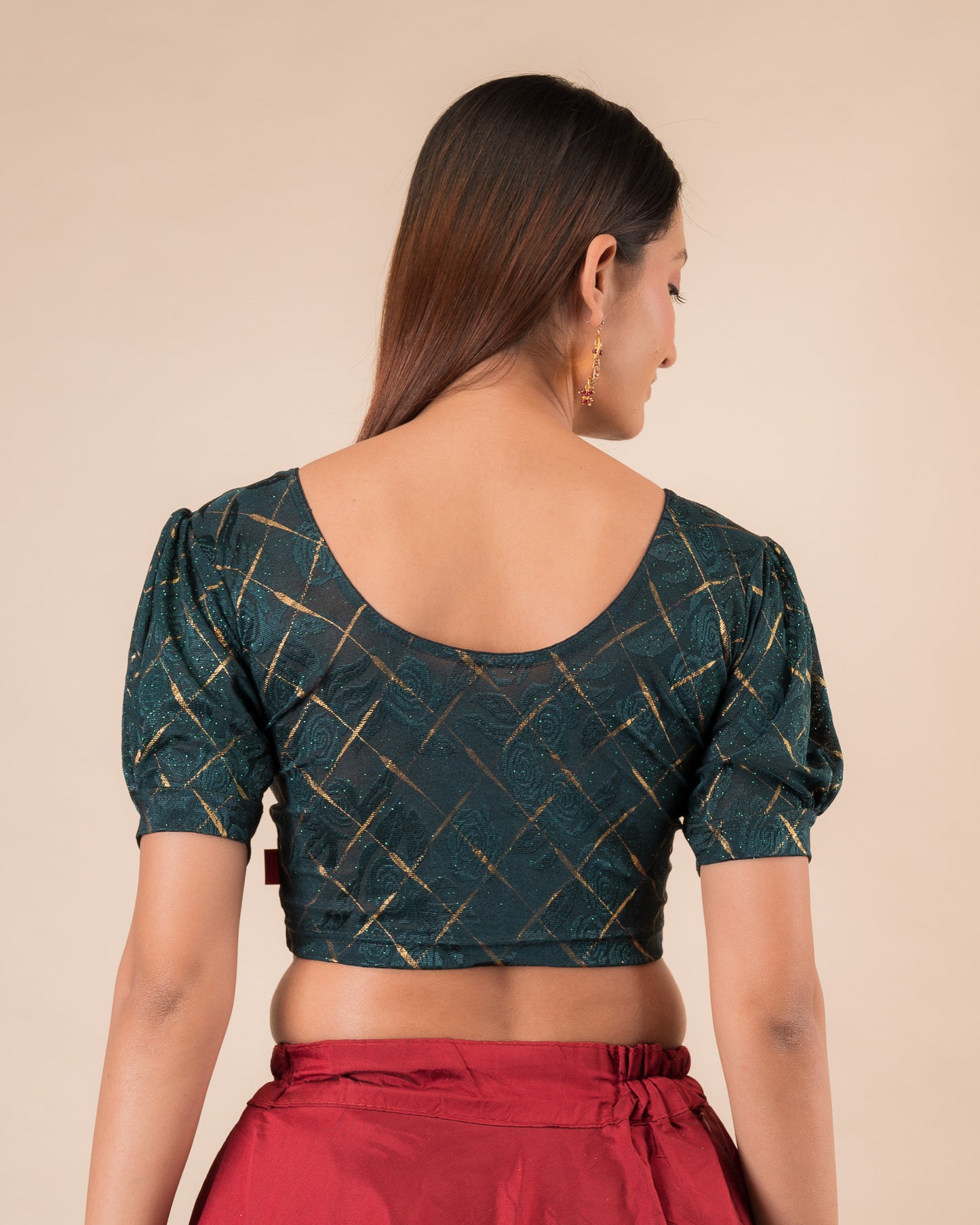 Rear view of the grey melange stretchable blouse showcasing the back design