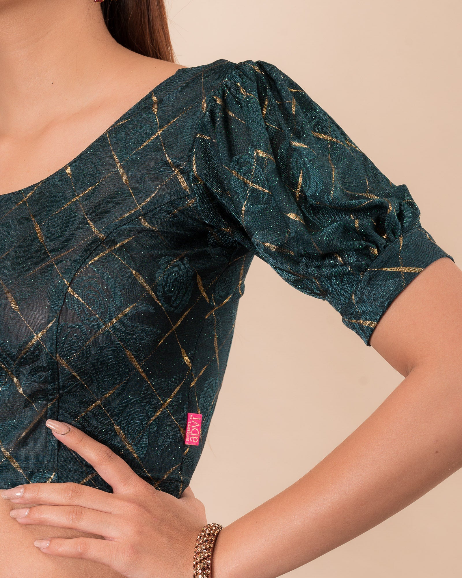 Close-up of the melange jacquard fabric detailing the texture and subtle gold glitter of the readymade blouse