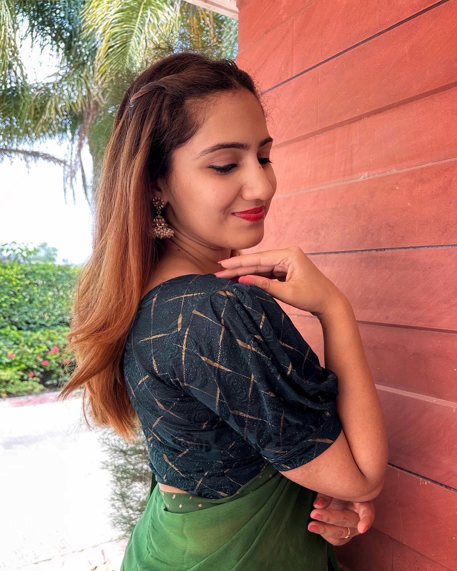 Model pairing the grey melange stretchable blouse with a traditional saree, demonstrating a complete ethnic look