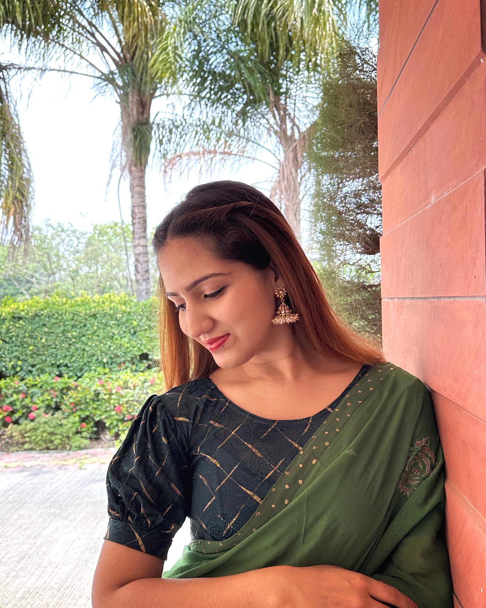 Model pairing the grey melange stretchable blouse with a traditional saree, demonstrating a complete ethnic look