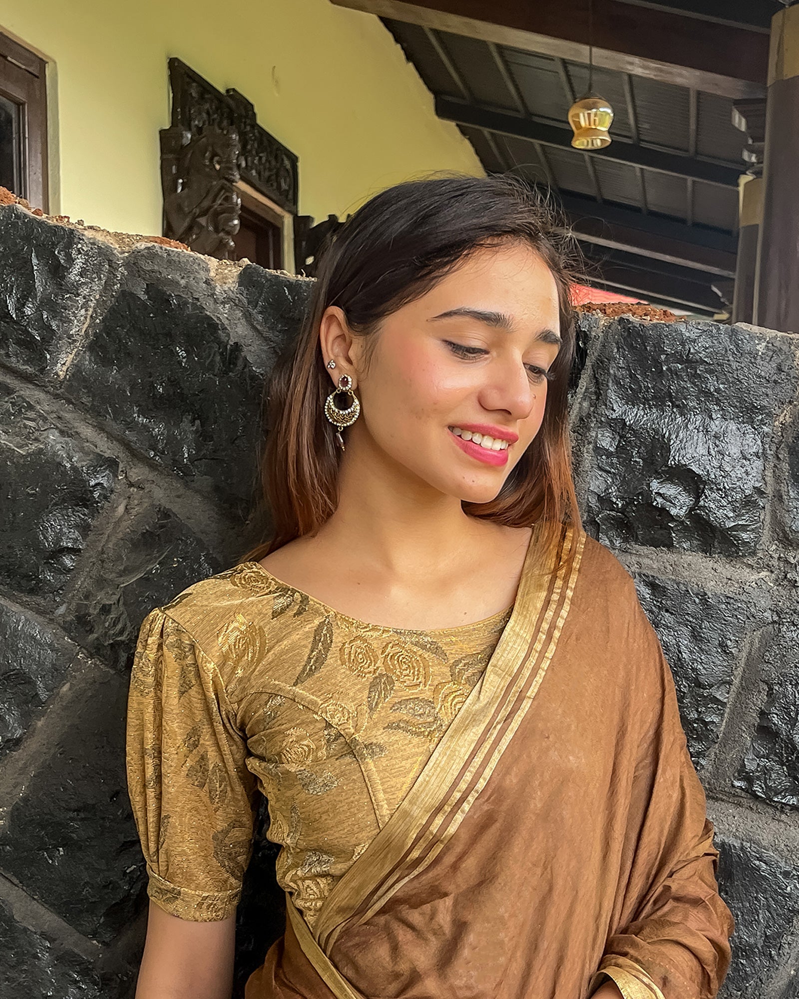 Model pairing the grey melange stretchable blouse with a traditional saree, demonstrating a complete ethnic look