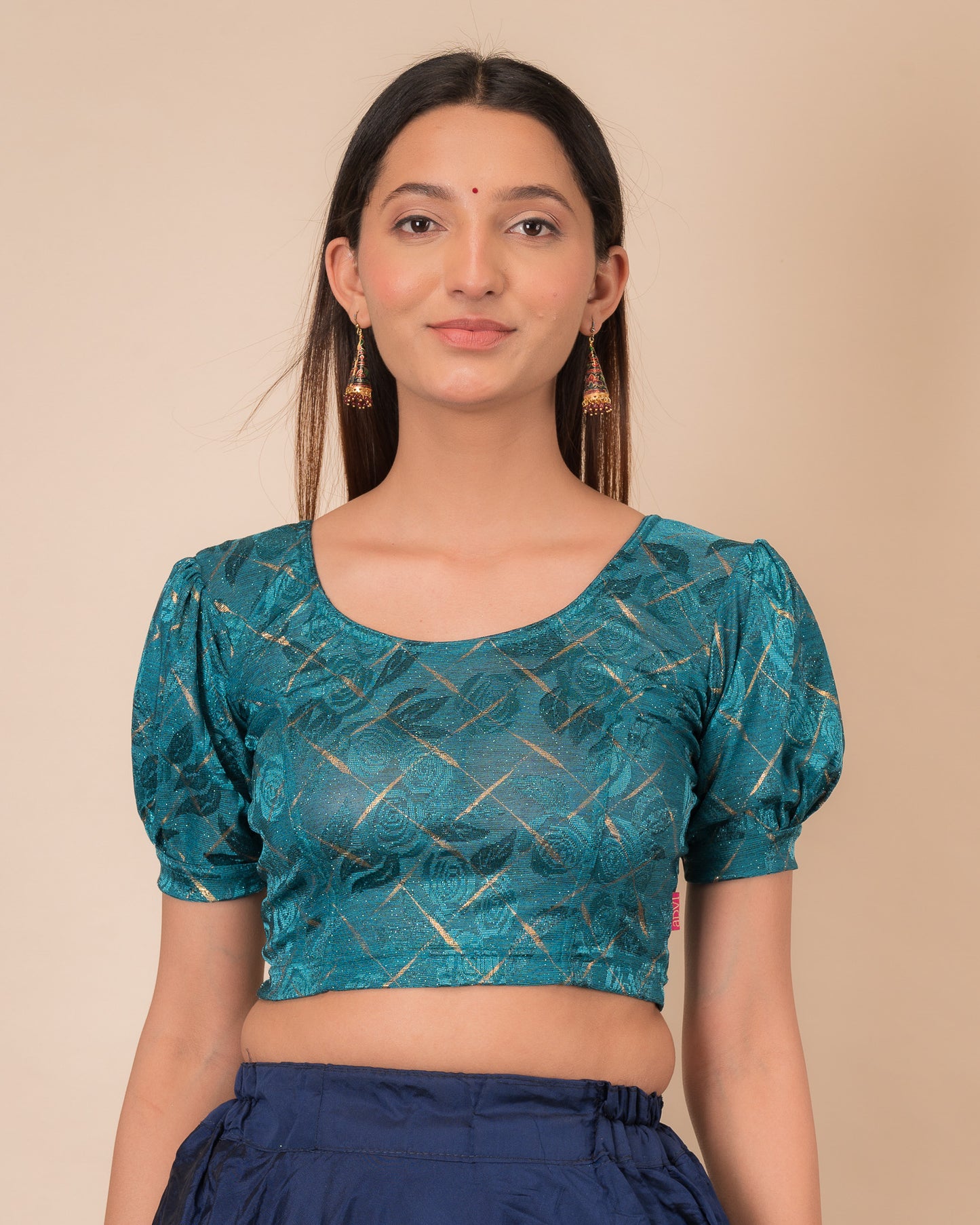 Model wearing a grey melange stretchable readymade blouse with puffed elbow sleeves and round neckline