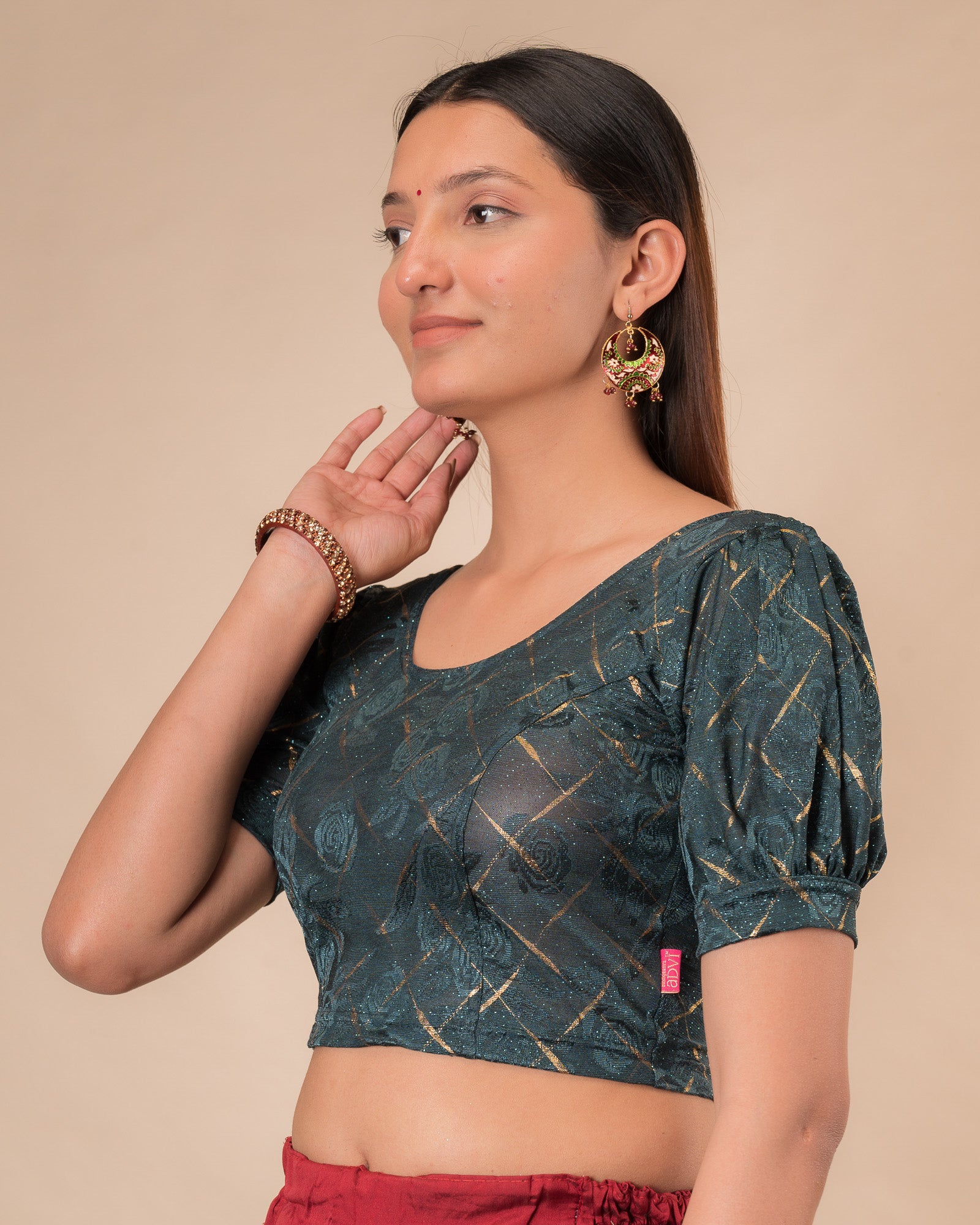Side profile of the grey melange stretchable blouse highlighting the fit and sleeve length