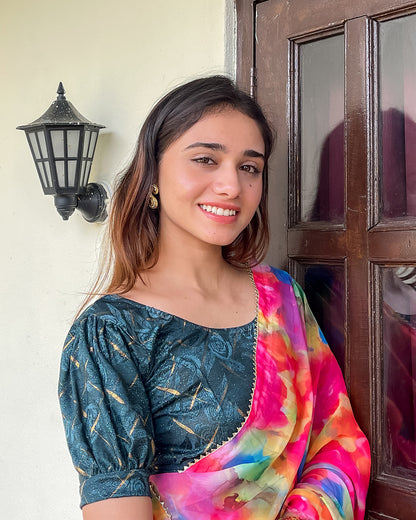 Model pairing the grey melange stretchable blouse with a traditional saree, demonstrating a complete ethnic look
