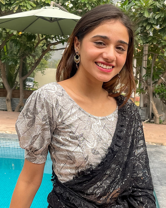 Model pairing the grey melange stretchable blouse with a traditional saree, demonstrating a complete ethnic look