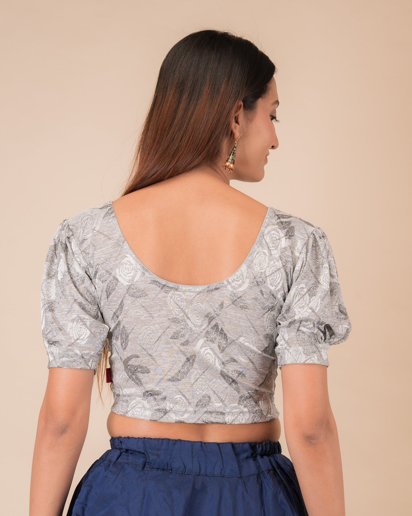Rear view of the grey melange stretchable blouse showcasing the back design
