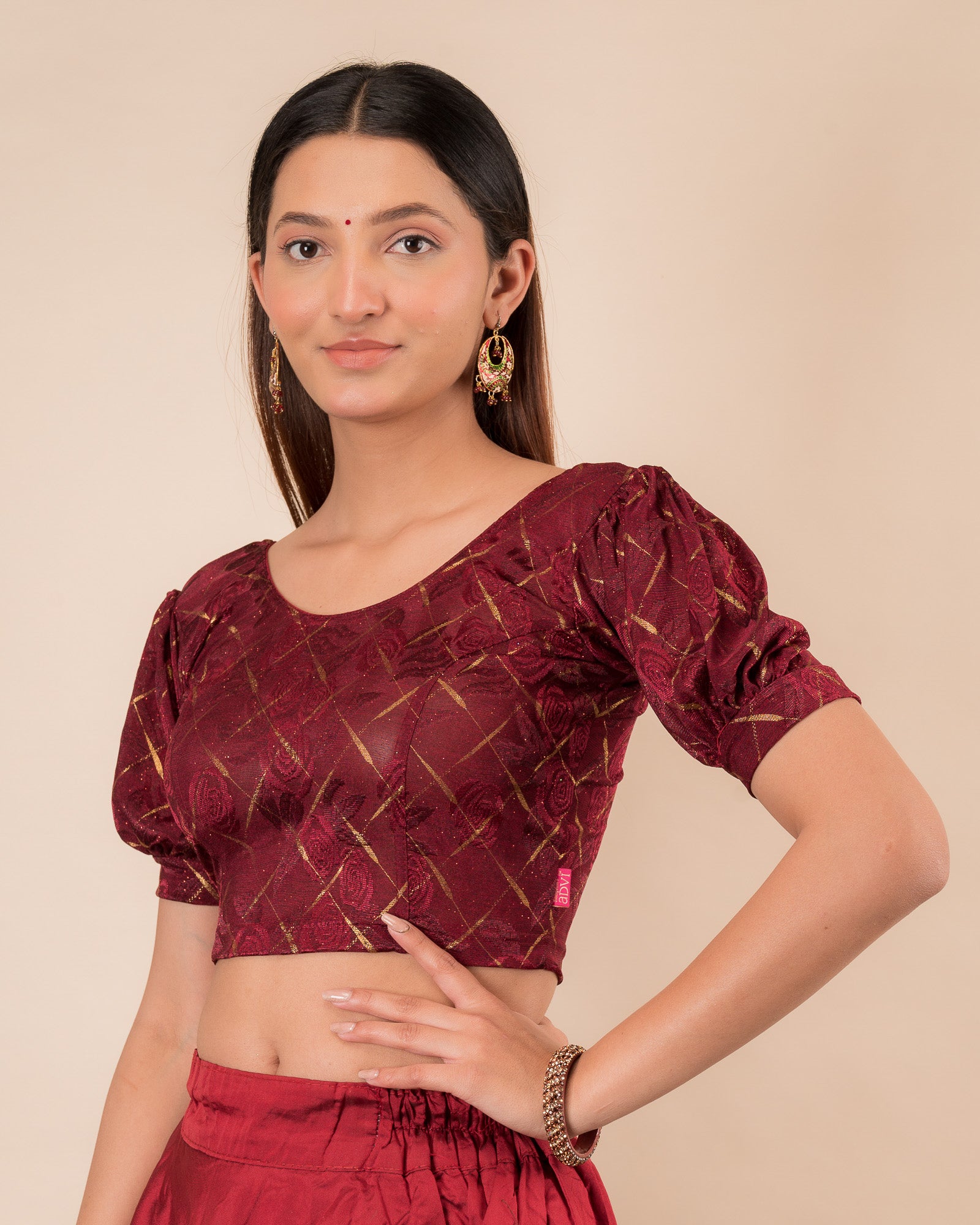 Side profile of the grey melange stretchable blouse highlighting the fit and sleeve length