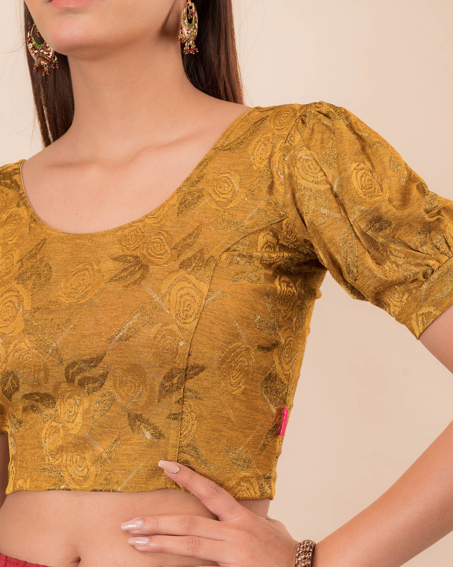 Close-up of the melange jacquard fabric detailing the texture and subtle gold glitter of the readymade blouse