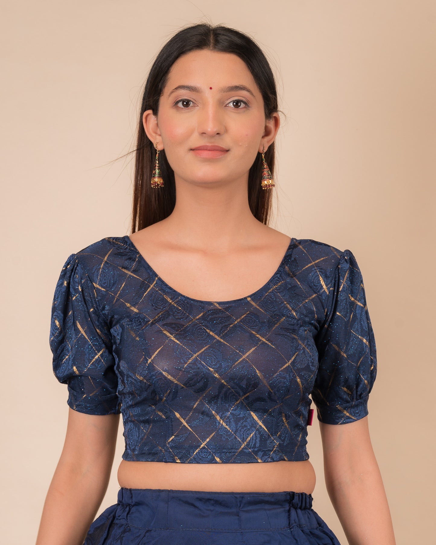 Model wearing a grey melange stretchable readymade blouse with puffed elbow sleeves and round neckline