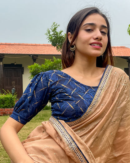 Model pairing the grey melange stretchable blouse with a traditional saree, demonstrating a complete ethnic look