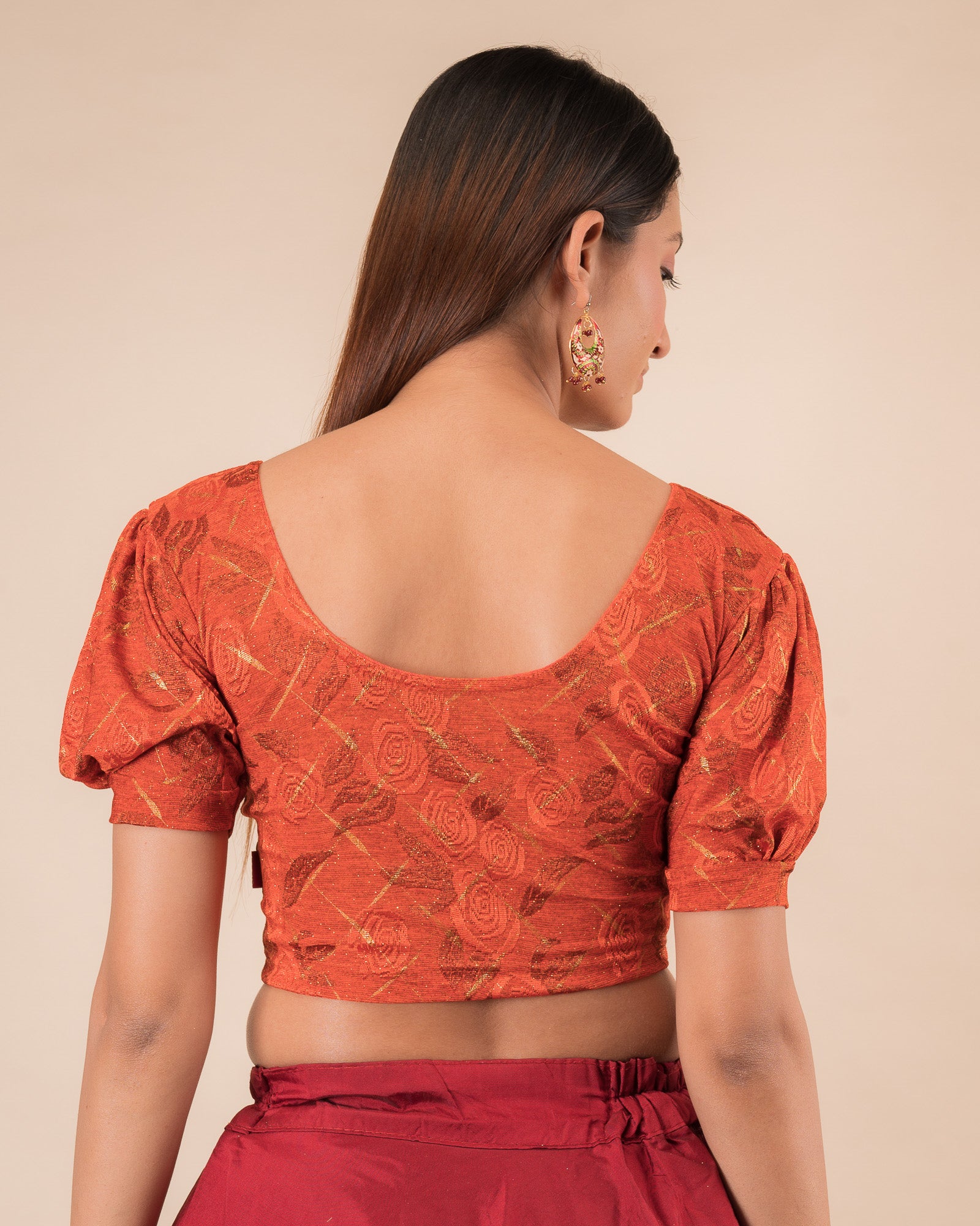 Rear view of the grey melange stretchable blouse showcasing the back design