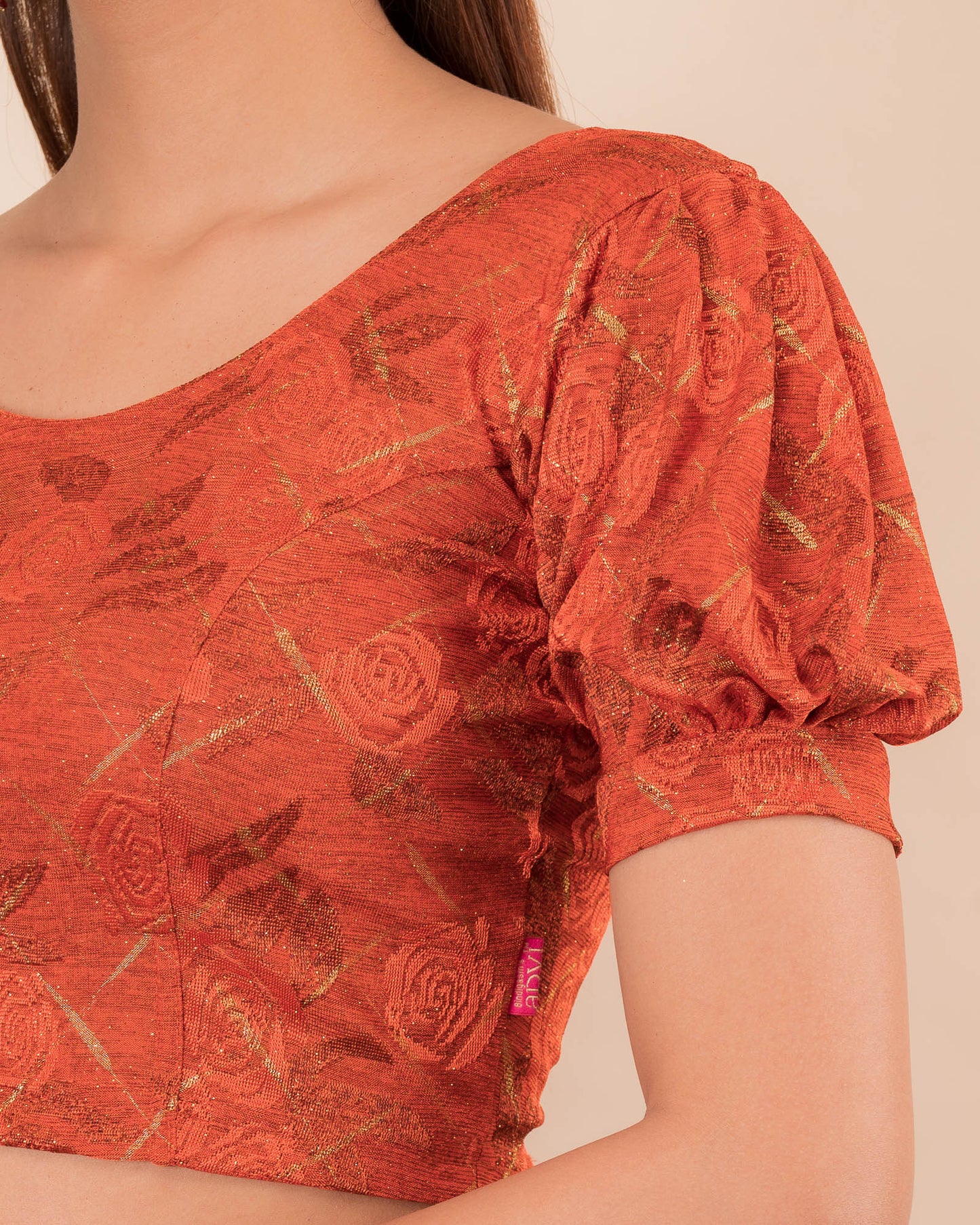 Close-up of the melange jacquard fabric detailing the texture and subtle gold glitter of the readymade blous
