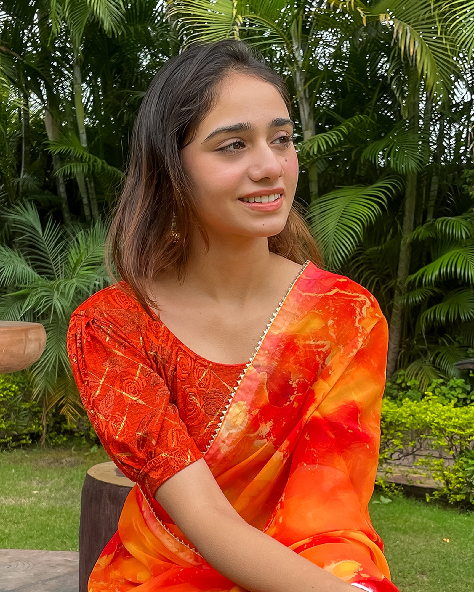 Model pairing the grey melange stretchable blouse with a traditional saree, demonstrating a complete ethnic look